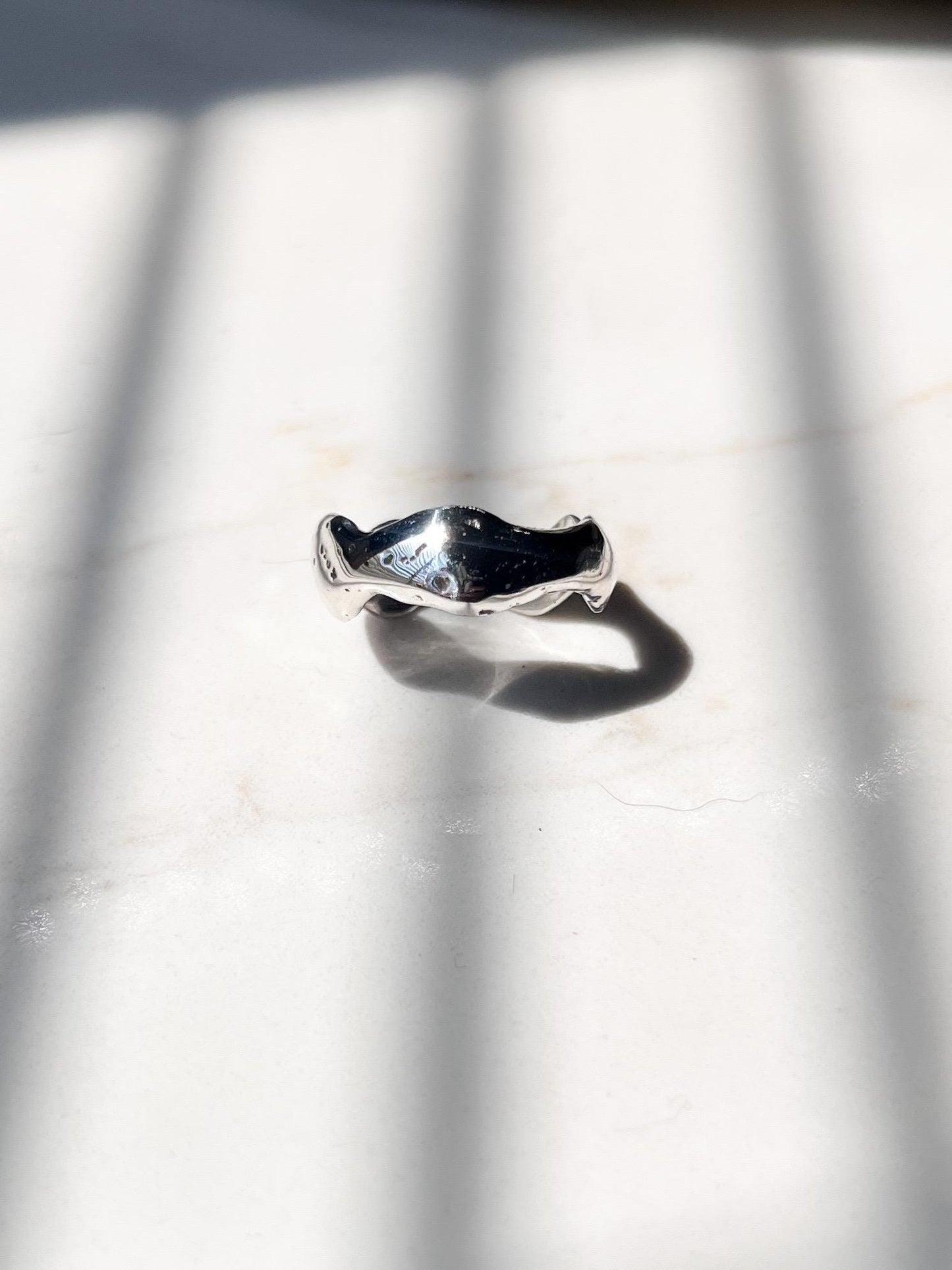 wave ring molten silver