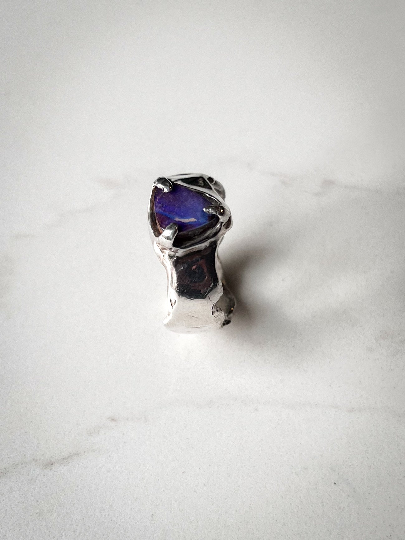 Wavy band and Claw Setting Blue Opal