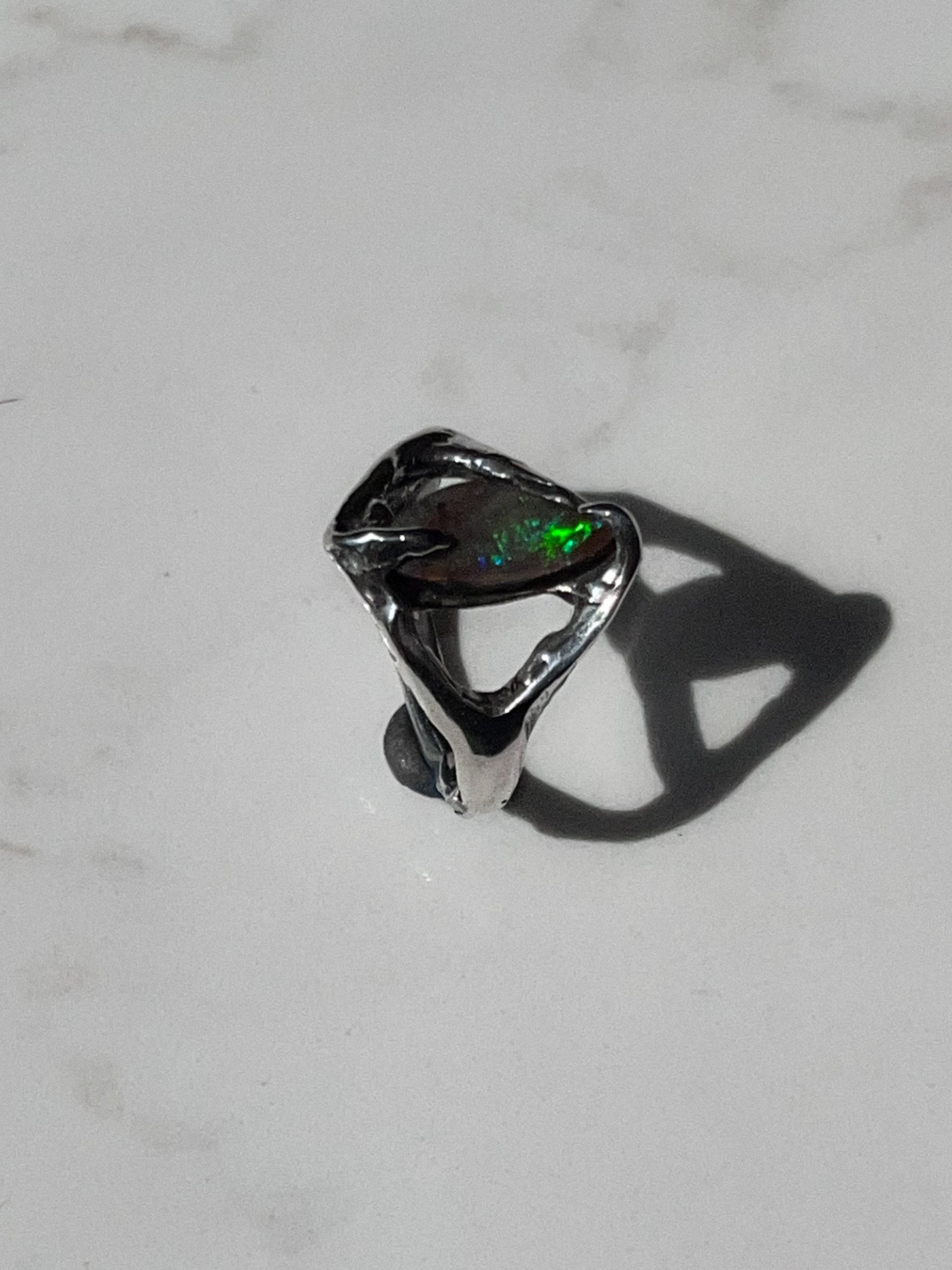 Side view of tales ring showing detail in metal